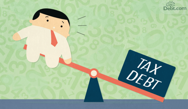 heavy tax burden and a man on a seesaw (illustrated)