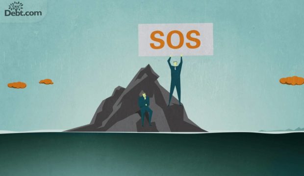 Two men stranded on an island, one is holding up an SOS sign.