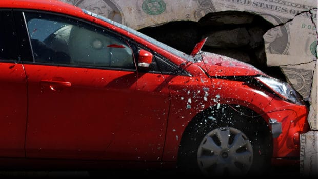 A car crashes into a wall made out of dollar bills signifying auto loan debt (illustrated)