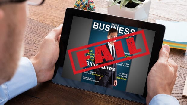 Man looking at expensive ipad with business magazine on cover with FAIL over it