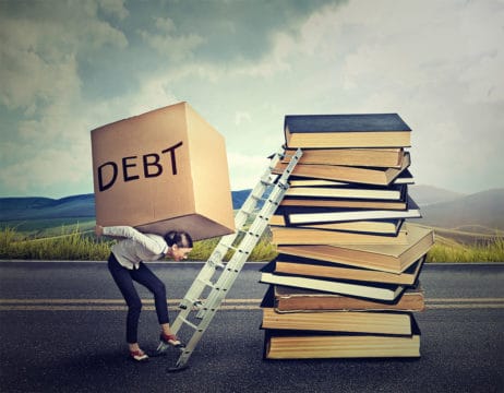 Woman carrying "debt box" on back. A depiction of the student debt crisis.