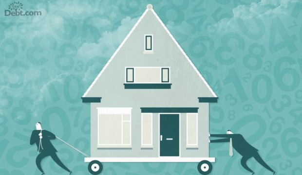 Bankers taking a house away on a cart. best way to prevent foreclosure