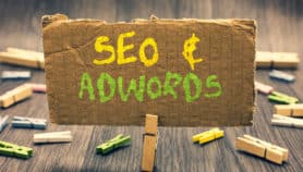 riting note showing Seo and Adwords. Business photo showcasing Pay per click Digital marketing Google Adsense
