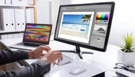 Designer Editing Photo On Computer