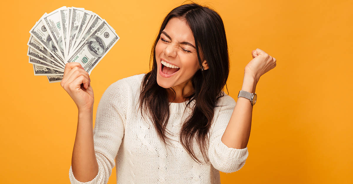 Woman With money and orange background