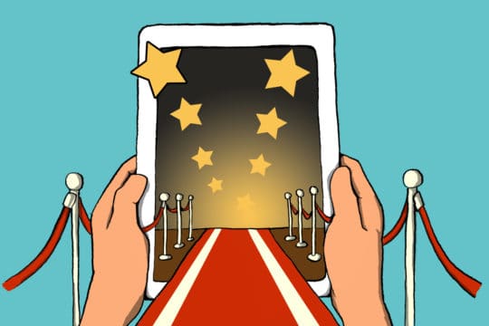 red carpet and velvet ropes leading to a tablet (illustrated)