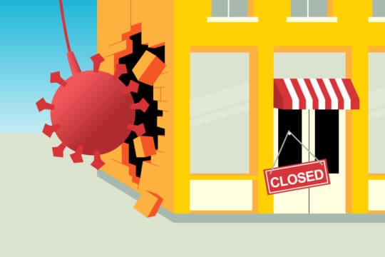 a business being demolished by a "corona virus" wrecking ball (illustrated)