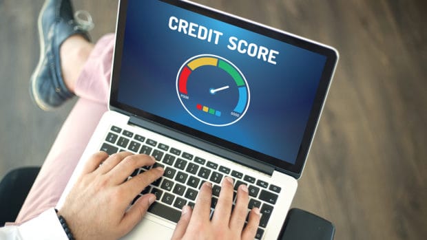 People using laptop and CREDIT SCORE concept on screen