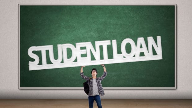 Young male college student holding a sign of student loan