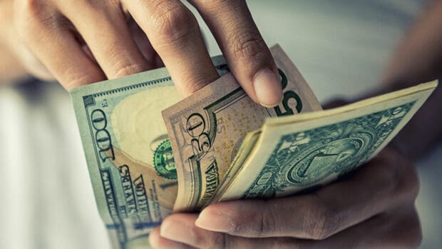 Close-up Hands counting money American dollars