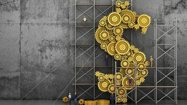 Financial concept. The gears mechanism in form of dollar sign