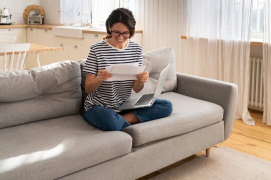 Woman reading a better credit report