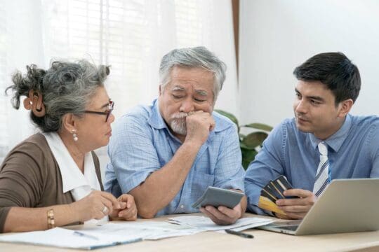 Couple looking over their retirement plans