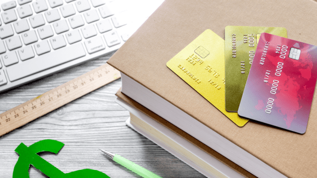 online pay for fee-paying education on gray student desk